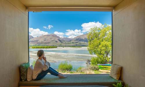 Sign to Glenorchy and Kinloch on the shores of Lake Wakatipu Queenstown